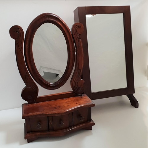 431 - OVAL TEAK DRESSING TABLE MIRROR
on a bow front base with three drawers, 56.5cm high, together with a... 