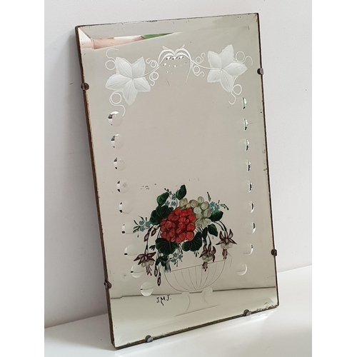 393 - RECTANGULAR WALL MIRROR
with a bevelled plate decorated with a vine and a bowl of flowers, 51cm x 30... 