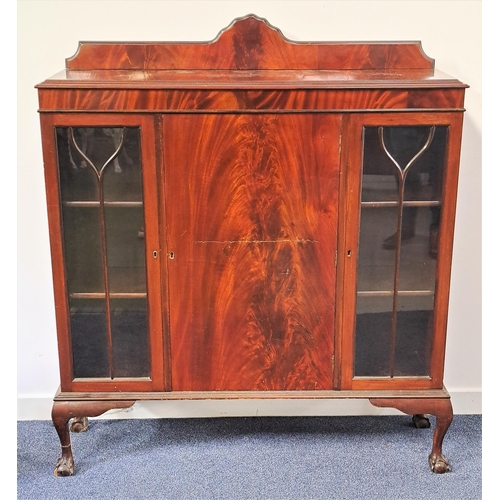 456 - MAHOGANY SIDE CABINET
the shaped raised back above a rectangular moulded top with a central panel do... 