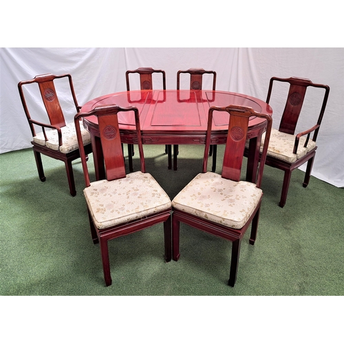 460 - CHINESE HARDWOOD DINING TABLE AND CHAIRS
the table with a pull apart top with two extra leaves, with... 