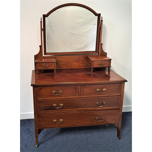 466 - VICTORIAN MAHOGANY AND INLAID DRESSING CHEST
with an arched bevelled mirror back above two jewellery... 