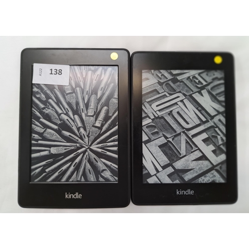 138 - TWO AMAZON KINDLE PAPERWHITE E-READERS
comprising a Paperwhite 4, serial number G000 PP13 0284 03P3 ... 