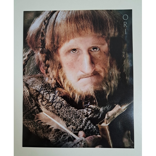 100 - ADAM BROWN
signed 10x8 colour photograph as Ori from The Hobbit: Battle of the Five Armies
Note: Eng... 