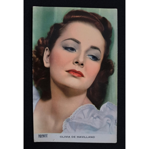 75 - OLIVIA DE HAVILLAND
signed black and white portrait postcard, together with a typed letter signed by... 