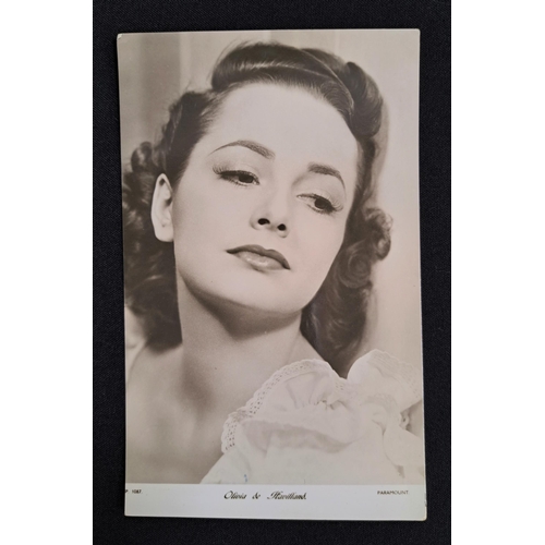 75 - OLIVIA DE HAVILLAND
signed black and white portrait postcard, together with a typed letter signed by... 