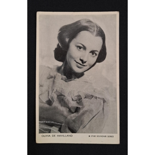 75 - OLIVIA DE HAVILLAND
signed black and white portrait postcard, together with a typed letter signed by... 