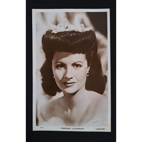 82 - MARGARET LOCKWOOD
two signed black and white portrait cards; together with two further postcards rel... 