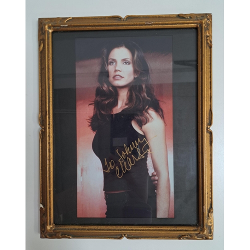 107 - CHARISMA CARPENTER
signed and framed colour photograph measuring approximately 23cm x 12.5cm. With d... 