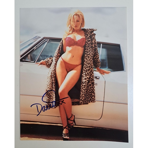 117 - DANII MINOGUE
signed 10x8 colour photograph 
Note: Australian singer, actress and presenter