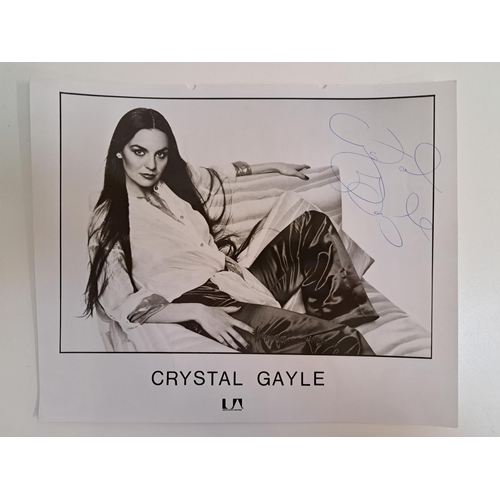 124 - CRYSTAL GAYLE
signed 10x8 black and white photograph. 
Note: American country music singer widely kn... 