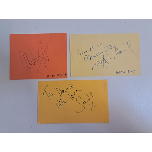 128 - THREE SIGNED AUTOGRAPH BOOK PAGES
comprising David Soul, Alvin Stardust and Sade, all three pages no... 