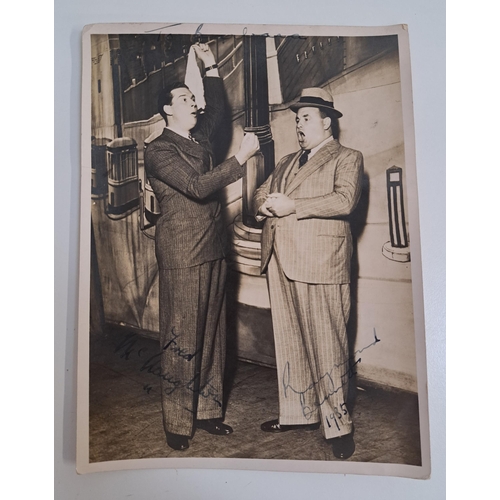 137 - FRED McNAUGHTON AND RAYMOND BENNETT
signed black and white photograph measuring 20.7cm x 15cm. With ... 