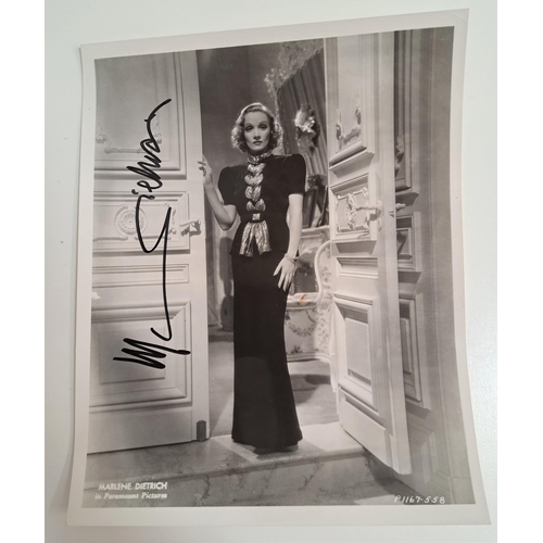 65A - MARLENE DIETRICH
signed 10x8 black and white photograph. 
Note: German-American actress and signer w... 