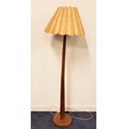 357 - TEAK STANDARD LAMP
raised on a circular base with a tapering column and scalloped shade, 153cm high