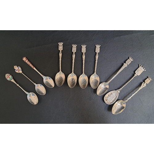 129 - SELECTION OF SILVER SOUVENIR SPOONS 
including a set of four comprising Wimereux, Menton, Nice and M... 