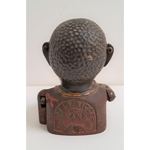 172 - NOVELTY MONEY BOX
with a mechanical arm and open mouth slot, 16cm high