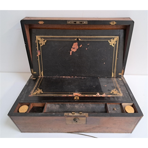 188 - EDWARDIAN WALNUT WRITING SLOPE
with brass edging and an inset presentation plaque, the fitted interi... 