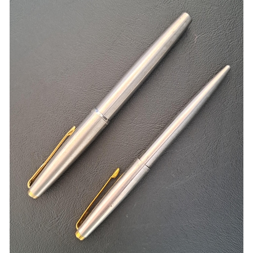 207 - PARKER 61 FOUNTAIN PEN
with a brushed steel body and cap, together with a matching Parker biro in br... 