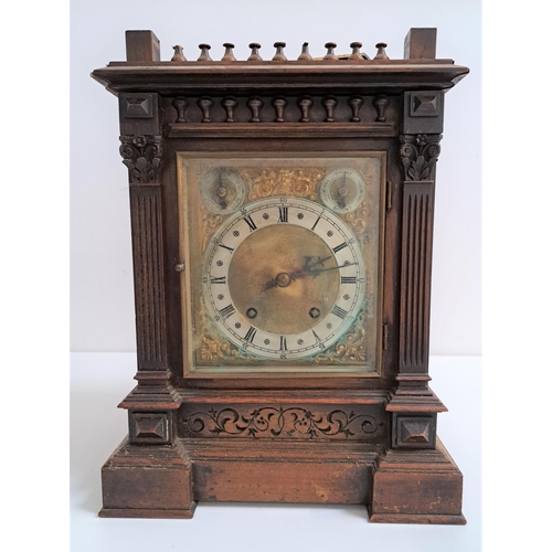 349 - GERMAN WINTERHALDER & HOFMEIER MANTLE CLOCK
in an oak case with a brass face and silvered chapter ri... 