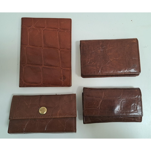 175 - SELECTION OF MULBERRY LEATHER ITEMS
comprising a passport cover, a key holder , a purse and a nail k... 