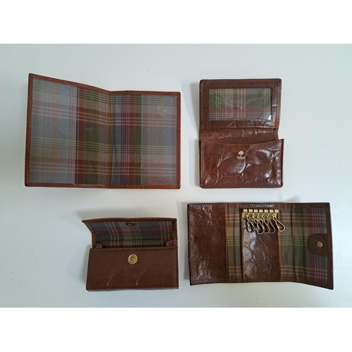 175 - SELECTION OF MULBERRY LEATHER ITEMS
comprising a passport cover, a key holder , a purse and a nail k... 