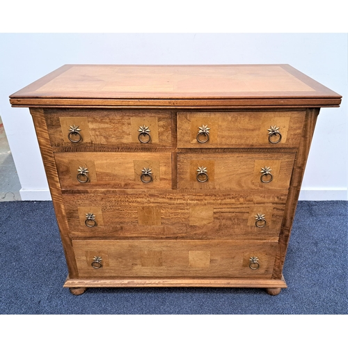 337 - TEAK AND CROSSBANDED CHEST OF DRAWERS
with a panelled top above four short and two long drawers with... 