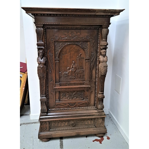 340 - 19th CENTURY FLEMISH CARVED OAK HALL CUPBOARD
with a carved panel door depicting a mother and child ... 