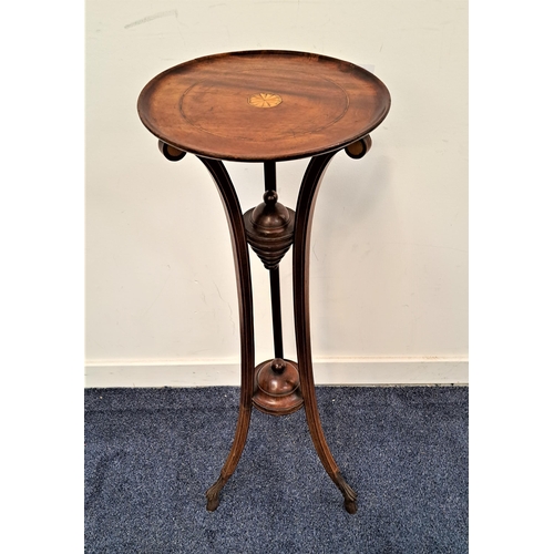 354 - MAHOGANY AND INLAID JARDINERE STAND
with a circular dished top on three shaped and inlaid supports w... 