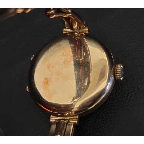 46 - LADIES FIFTEEN CARAT GOLD WRISTWATCH
by James Weir Glasgow, the white enamel dial with Arabic numera... 