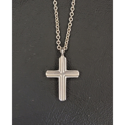 61 - TIFFANY & CO. SILVER CONCAVE CROSS NECKLACE
the concave design cross on a Tiffany & Co. silver chain