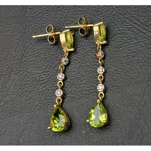 101 - THREE PAIRS OF GEM AND STONE SET EARRINGS
comprising a pair of peridot and diamond drop earrings in ... 