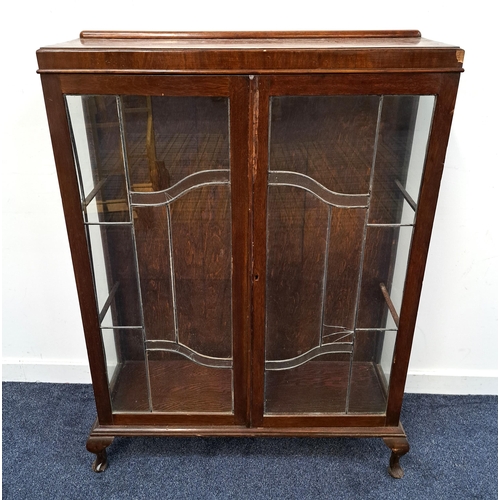 388 - MAHOGANY DISPLAY CABINET
with a raised back above a moulded top with glass side panels and leaded gl... 