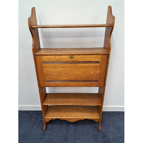 397 - 1920s OAK STUDENTS BUREAU BOOKCASE
with shaped side supports, three shelves and a fall flap opening ... 