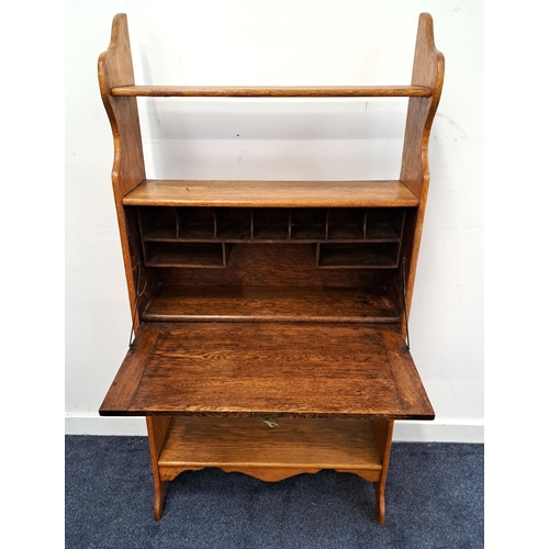 397 - 1920s OAK STUDENTS BUREAU BOOKCASE
with shaped side supports, three shelves and a fall flap opening ... 