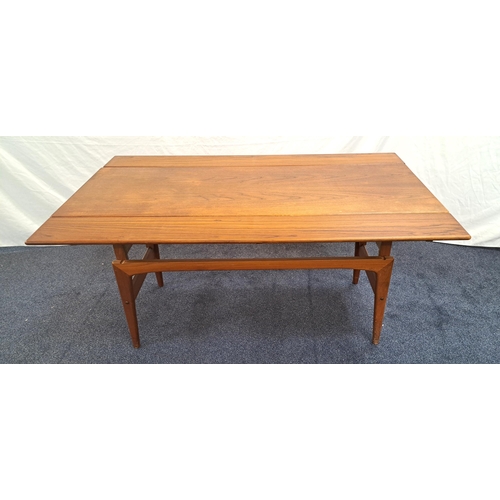 402 - MID-CENTURY TRIOCH OF DENMARK METAMORPHIC COFFEE/DINING TABLE
in teak with drawleaf sides and riser ... 