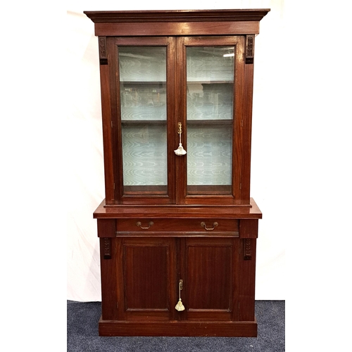 418 - MAHOGANY CUPBOARD BOOLCASE
with a moulded cornice above a pair of glass doors with a shelved interio... 