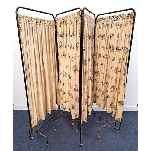 433 - 1930s HOSPITAL FOUR FOLD SCREEN
on casters and with floral fabric panels, 172cm high