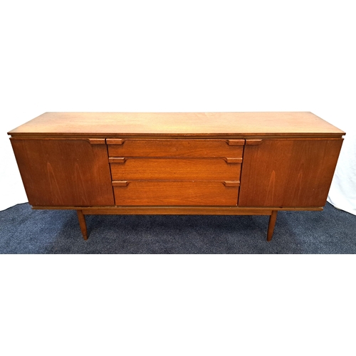 440 - MID-CENTURY AUSTIN SUITE TEAK SIDEBOARD
with a rectangular top above three central graduated drawers... 