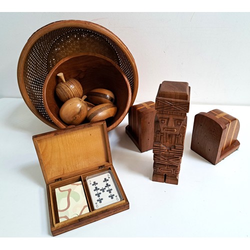 212 - SELECTION OF CARVED AND INLAID WOODEN ITEMS
comprising an inlaid card box, specimen wood eggs and fr... 