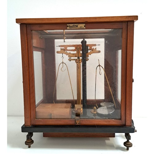 218 - SET OF OERTLING SCIENTIFIC SCALES
model 48G.C, in a mahogany and glass case with a selection of weig... 