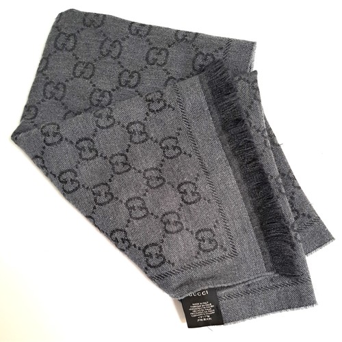 257 - GUCCI GG JACQUARD PATTERN KNITTED SCARF
100% wool, 48 x 180cm