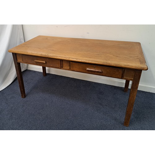 379 - VINTAGE ABBES OAK DESK
with a rectangular top above two frieze drawers, standing on plain supports, ... 