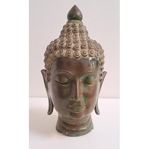 236 - BRONZE HEAD OF BUDDHA
in the 15th century Lan Na style possibly of the period, the face with a seren... 