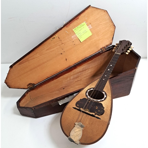 264 - ITALIAN MANDOLIN
with an interior label, 'Michele Celentano, Napoli', in a shaped case