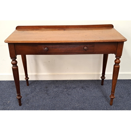 387 - VICTORIAN MAHOGANY SIDE TABLE
with a raised back above a moulded D shaped top with a central frieze ... 