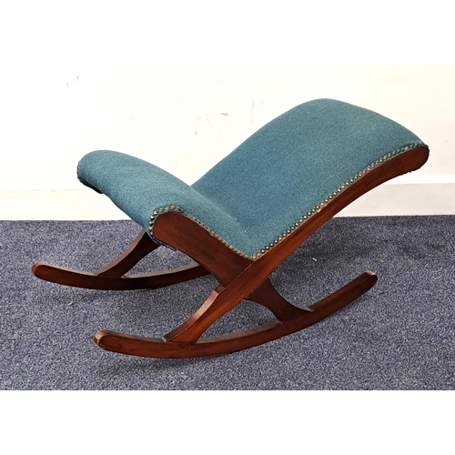 391 - MAHOGANY FRAME GOUT STOOL
with a padded leg and foot rest with decorative stud detail on rockers