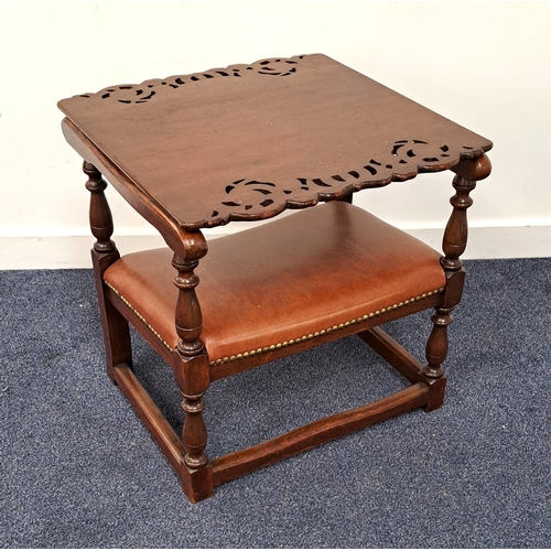 393 - OAK MONKS CHAIR
with a slide and fold-over carved and shaped back above shaped arms on turned column... 