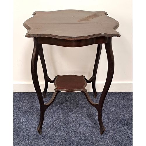 429 - EDWARDIAN MAHOGANY WINDOW TABLE
with a circular shaped top standing on four cabriole supports united... 