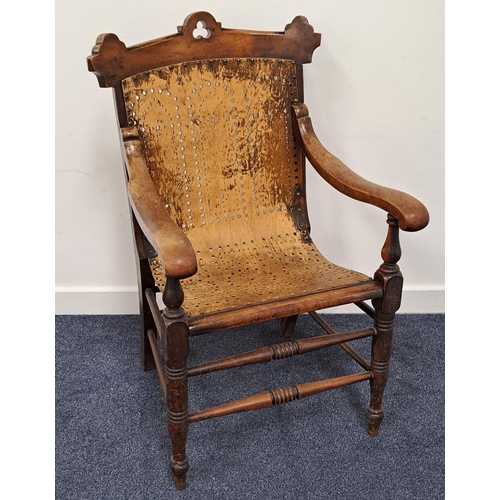 431 - ARTS AND CRAFTS BENTWOOD ARMCHAIR
with a shaped carved and pierced top rail above a pressed pierced ... 