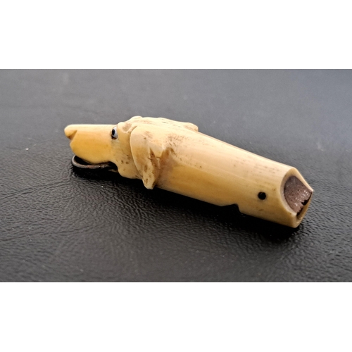 242 - 19th CENTURY BONE DOG WHISTLE
modelled as a hound with bead eyes and suspension ring to the mouth, 6... 